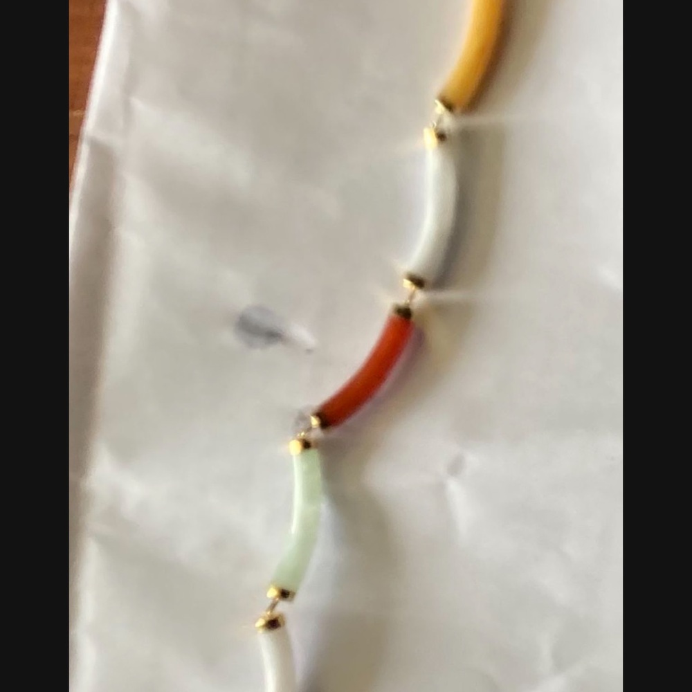 Multi colored jade bracelet with 14kt gold